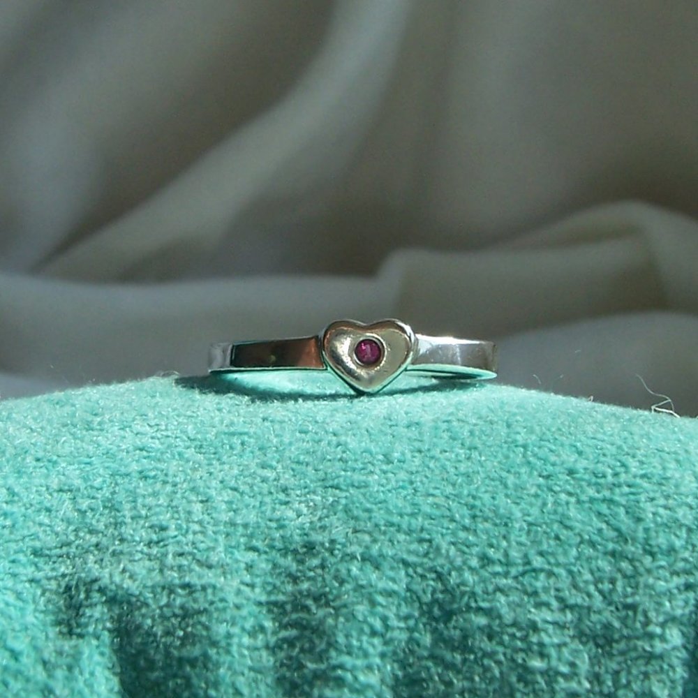 TIFFANY & CO. PALOMA PICASSO STERLING SILVER "TENDERNESS" RING